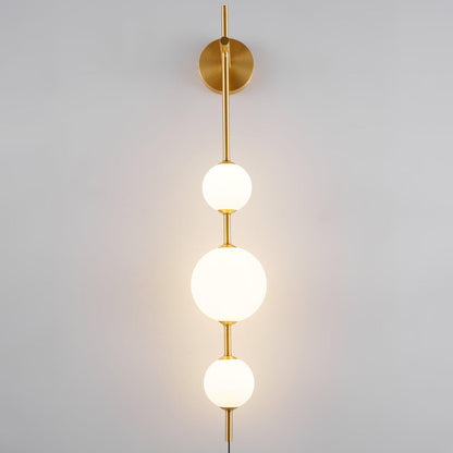 Vertical Globe Plug In Wall Lamp