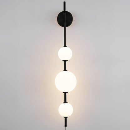 Vertical Globe Plug In Wall Lamp