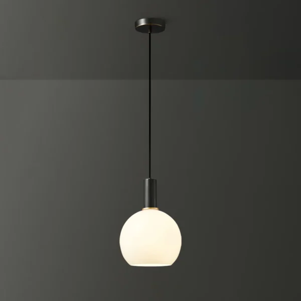 Our Vivid Glass Pendant Light is made with premium materials, featuring a milky white glass shade in three unique shapes and a brass body. This elegant light adds aesthetic charm to any home, bringing warmth and sophistication.