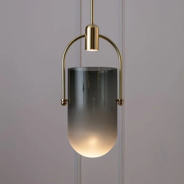 Well Arc Glass Pendant is featuring an architectural design. This modern pendant light arches down, elegantly balancing a frosted glass shade. The spot-led bulb freely rests on the arched arm and the led lighting shoots light into a sandblasted glass dome, the fixture creates a warm glow inside the glass.