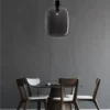 Delicate pendant lights inspired by air bubbles wrapped in a liquid.