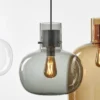 Delicate pendant lights inspired by air bubbles wrapped in a liquid.