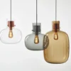 Delicate pendant lights inspired by air bubbles wrapped in a liquid.