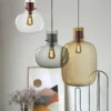 Delicate pendant lights inspired by air bubbles wrapped in a liquid.