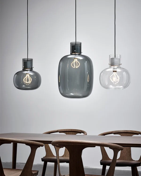 Delicate pendant lights inspired by air bubbles wrapped in a liquid.