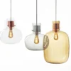 Delicate pendant lights inspired by air bubbles wrapped in a liquid.