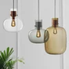 Delicate pendant lights inspired by air bubbles wrapped in a liquid.