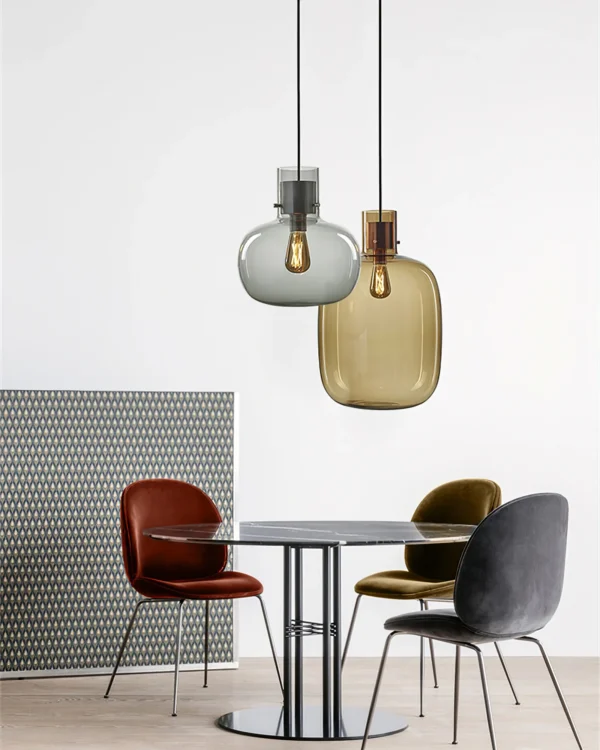 Delicate pendant lights inspired by air bubbles wrapped in a liquid.