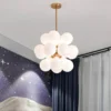 Inspired by the bubble, the milk white glass balls match together, which is like a bubble floating in the air, producing a sense of lightness, float around a center light globe, diffusing the light into a natural glows. Is the Perfect Balance Between Functionality and Elegance. ideal for daily indoor use.