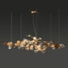 Born out of the dense and untamable tropical forests, the Gold Leaf Chandelier plant serves as the inspiration for new collection, to which it also lends its name, its elegance, and its graciousness. 