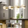 Brass Modern and contemporary lighting comes alive in this exquisite and unique design. The Grand Lustre Pendant Lamp collection is the perfect addition to any modern decor through its sophisticated and incredibly intriguing design.