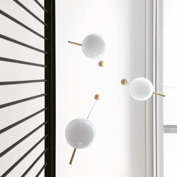 The glass shade of the Lux Round Pendant Light is expertly crafted to perfection, offering a flawless surface that allows the light to filter through beautifully. The rounded shape of the shade adds a sense of softness and fluidity to the design, while the brass accents provide a touch of modern flair.