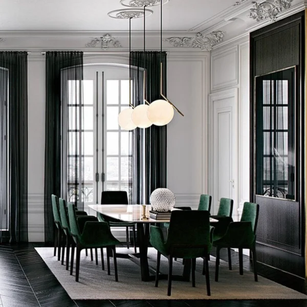 The glass shade of the Lux Round Pendant Light is expertly crafted to perfection, offering a flawless surface that allows the light to filter through beautifully. The rounded shape of the shade adds a sense of softness and fluidity to the design, while the brass accents provide a touch of modern flair.