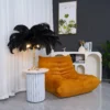 Feather your nest with the Ostrich Feather Table Lamp, romantic and feminine this sultry lamp will make a statement in your bedroom or living room. Its elegant gilded base supports real, Ostrich feathers. 