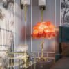 Feather your nest with the Ostrich Feather Table Lamp, romantic and feminine this sultry lamp will make a statement in your bedroom or living room. Its elegant gilded base supports real, Ostrich feathers. 