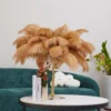 Feather your nest with the Ostrich Feather Table Lamp, romantic and feminine this sultry lamp will make a statement in your bedroom or living room. Its elegant gilded base supports real, Ostrich feathers. 