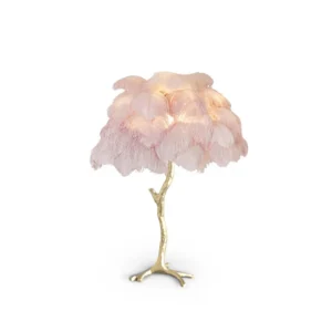 Feather your nest with the Ostrich Feather Table Lamp, romantic and feminine this sultry lamp will make a statement in your bedroom or living room. Its elegant gilded base supports real, Ostrich feathers. 