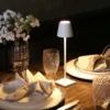 The fixture is made up of metal with LED light source, ensuring a clean display along with a tasteful layer of light. This piece lights the way wherever it is placed, providing a full and inviting glow. Its square base ensures a sturdy display. Purchase Notes: Only supports shipping to Japan, Australia, the EU, and the United States, other countries do not support shipping. If you have any questions about our products, please contact us and we will get back to you within 24 hours. Product Size Size: ∅ 4.3″ x H 15″ / Dia 11cm x H 38cm Details Material: Metal, Acrylic, Aluminum alloy Light source: Integrated LED Voltage: AC 110-240V Battery capacity (mAh): 2000 mAh Charging voltage: 5V---2A or 8V---2A Charging time: ~3 hours to fully charge Continuous discharge time: the maximum power can be used for about 3 hours, and the minimum power can be used continuously for about 10 hours. Color: White, Black, Gold, Pink, Silver Control method: Touch switch (Dimmable) We provide with USB charging cable. Approved: ETL, UL listed and CE, SAA certification.