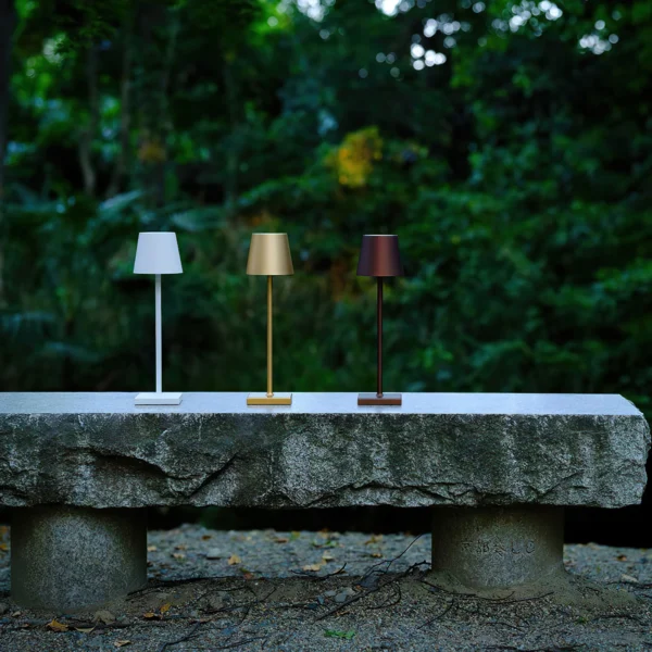 The fixture is made up of metal with LED light source, ensuring a clean display along with a tasteful layer of light. This piece lights the way wherever it is placed, providing a full and inviting glow. Its square base ensures a sturdy display. Purchase Notes: Only supports shipping to Japan, Australia, the EU, and the United States, other countries do not support shipping. If you have any questions about our products, please contact us and we will get back to you within 24 hours. Product Size Size: ∅ 4.3″ x H 15″ / Dia 11cm x H 38cm Details Material: Metal, Acrylic, Aluminum alloy Light source: Integrated LED Voltage: AC 110-240V Battery capacity (mAh): 2000 mAh Charging voltage: 5V---2A or 8V---2A Charging time: ~3 hours to fully charge Continuous discharge time: the maximum power can be used for about 3 hours, and the minimum power can be used continuously for about 10 hours. Color: White, Black, Gold, Pink, Silver Control method: Touch switch (Dimmable) We provide with USB charging cable. Approved: ETL, UL listed and CE, SAA certification.