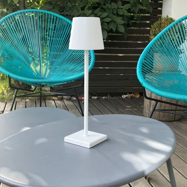 The fixture is made up of metal with LED light source, ensuring a clean display along with a tasteful layer of light. This piece lights the way wherever it is placed, providing a full and inviting glow. Its square base ensures a sturdy display. Purchase Notes: Only supports shipping to Japan, Australia, the EU, and the United States, other countries do not support shipping. If you have any questions about our products, please contact us and we will get back to you within 24 hours. Product Size Size: ∅ 4.3″ x H 15″ / Dia 11cm x H 38cm Details Material: Metal, Acrylic, Aluminum alloy Light source: Integrated LED Voltage: AC 110-240V Battery capacity (mAh): 2000 mAh Charging voltage: 5V---2A or 8V---2A Charging time: ~3 hours to fully charge Continuous discharge time: the maximum power can be used for about 3 hours, and the minimum power can be used continuously for about 10 hours. Color: White, Black, Gold, Pink, Silver Control method: Touch switch (Dimmable) We provide with USB charging cable. Approved: ETL, UL listed and CE, SAA certification.