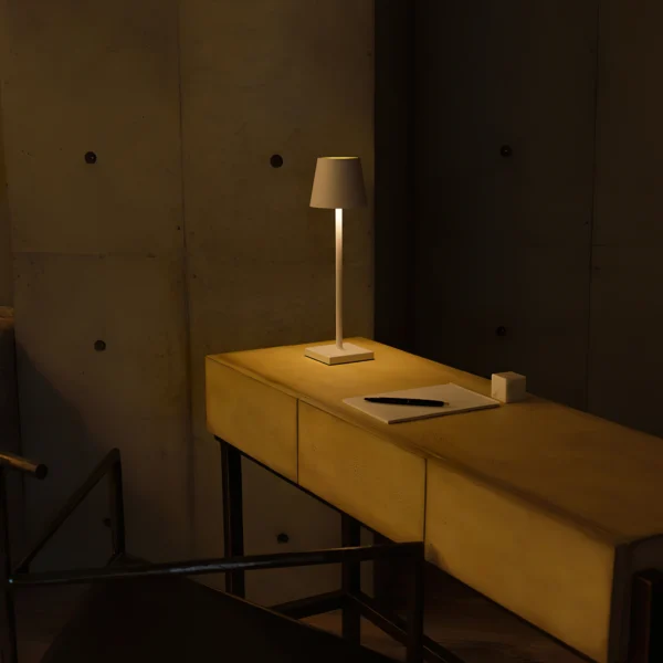 The fixture is made up of metal with LED light source, ensuring a clean display along with a tasteful layer of light. This piece lights the way wherever it is placed, providing a full and inviting glow. Its square base ensures a sturdy display. Purchase Notes: Only supports shipping to Japan, Australia, the EU, and the United States, other countries do not support shipping. If you have any questions about our products, please contact us and we will get back to you within 24 hours. Product Size Size: ∅ 4.3″ x H 15″ / Dia 11cm x H 38cm Details Material: Metal, Acrylic, Aluminum alloy Light source: Integrated LED Voltage: AC 110-240V Battery capacity (mAh): 2000 mAh Charging voltage: 5V---2A or 8V---2A Charging time: ~3 hours to fully charge Continuous discharge time: the maximum power can be used for about 3 hours, and the minimum power can be used continuously for about 10 hours. Color: White, Black, Gold, Pink, Silver Control method: Touch switch (Dimmable) We provide with USB charging cable. Approved: ETL, UL listed and CE, SAA certification.