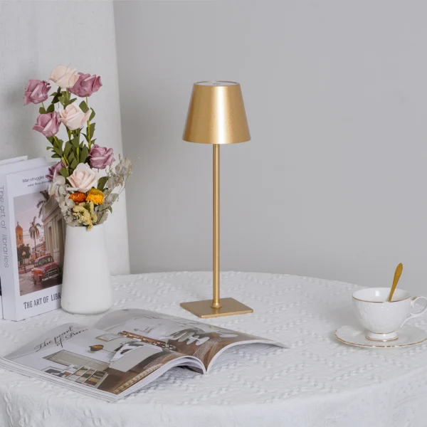 The fixture is made up of metal with LED light source, ensuring a clean display along with a tasteful layer of light. This piece lights the way wherever it is placed, providing a full and inviting glow. Its square base ensures a sturdy display. Purchase Notes: Only supports shipping to Japan, Australia, the EU, and the United States, other countries do not support shipping. If you have any questions about our products, please contact us and we will get back to you within 24 hours. Product Size Size: ∅ 4.3″ x H 15″ / Dia 11cm x H 38cm Details Material: Metal, Acrylic, Aluminum alloy Light source: Integrated LED Voltage: AC 110-240V Battery capacity (mAh): 2000 mAh Charging voltage: 5V---2A or 8V---2A Charging time: ~3 hours to fully charge Continuous discharge time: the maximum power can be used for about 3 hours, and the minimum power can be used continuously for about 10 hours. Color: White, Black, Gold, Pink, Silver Control method: Touch switch (Dimmable) We provide with USB charging cable. Approved: ETL, UL listed and CE, SAA certification.
