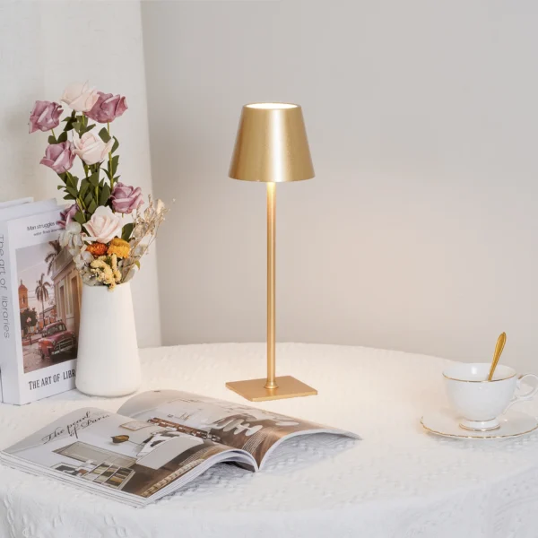 The fixture is made up of metal with LED light source, ensuring a clean display along with a tasteful layer of light. This piece lights the way wherever it is placed, providing a full and inviting glow. Its square base ensures a sturdy display. Purchase Notes: Only supports shipping to Japan, Australia, the EU, and the United States, other countries do not support shipping. If you have any questions about our products, please contact us and we will get back to you within 24 hours. Product Size Size: ∅ 4.3″ x H 15″ / Dia 11cm x H 38cm Details Material: Metal, Acrylic, Aluminum alloy Light source: Integrated LED Voltage: AC 110-240V Battery capacity (mAh): 2000 mAh Charging voltage: 5V---2A or 8V---2A Charging time: ~3 hours to fully charge Continuous discharge time: the maximum power can be used for about 3 hours, and the minimum power can be used continuously for about 10 hours. Color: White, Black, Gold, Pink, Silver Control method: Touch switch (Dimmable) We provide with USB charging cable. Approved: ETL, UL listed and CE, SAA certification.