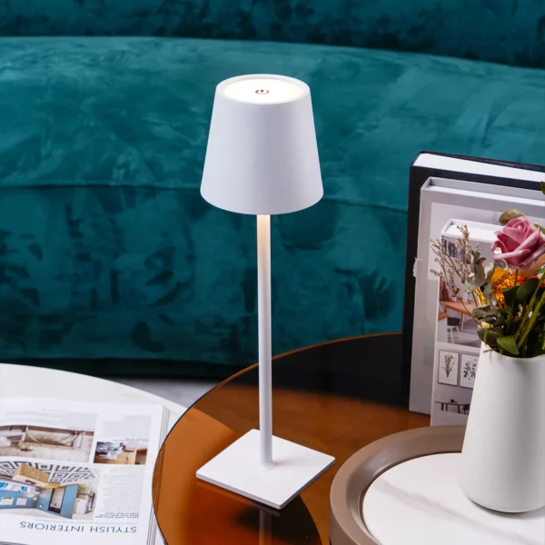 The fixture is made up of metal with LED light source, ensuring a clean display along with a tasteful layer of light. This piece lights the way wherever it is placed, providing a full and inviting glow. Its square base ensures a sturdy display. Purchase Notes: Only supports shipping to Japan, Australia, the EU, and the United States, other countries do not support shipping. If you have any questions about our products, please contact us and we will get back to you within 24 hours. Product Size Size: ∅ 4.3″ x H 15″ / Dia 11cm x H 38cm Details Material: Metal, Acrylic, Aluminum alloy Light source: Integrated LED Voltage: AC 110-240V Battery capacity (mAh): 2000 mAh Charging voltage: 5V---2A or 8V---2A Charging time: ~3 hours to fully charge Continuous discharge time: the maximum power can be used for about 3 hours, and the minimum power can be used continuously for about 10 hours. Color: White, Black, Gold, Pink, Silver Control method: Touch switch (Dimmable) We provide with USB charging cable. Approved: ETL, UL listed and CE, SAA certification.
