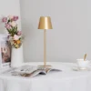 The fixture is made up of metal with LED light source, ensuring a clean display along with a tasteful layer of light. This piece lights the way wherever it is placed, providing a full and inviting glow. Its square base ensures a sturdy display. Purchase Notes: Only supports shipping to Japan, Australia, the EU, and the United States, other countries do not support shipping. If you have any questions about our products, please contact us and we will get back to you within 24 hours. Product Size Size: ∅ 4.3″ x H 15″ / Dia 11cm x H 38cm Details Material: Metal, Acrylic, Aluminum alloy Light source: Integrated LED Voltage: AC 110-240V Battery capacity (mAh): 2000 mAh Charging voltage: 5V---2A or 8V---2A Charging time: ~3 hours to fully charge Continuous discharge time: the maximum power can be used for about 3 hours, and the minimum power can be used continuously for about 10 hours. Color: White, Black, Gold, Pink, Silver Control method: Touch switch (Dimmable) We provide with USB charging cable. Approved: ETL, UL listed and CE, SAA certification.