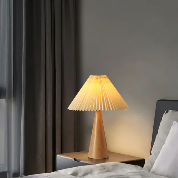 Doubling as a modern accent piece and a source of light, this Stringer Table Lamp makes a statement as it boosts the brightness in your space. Defined by its distinctive mix of materials