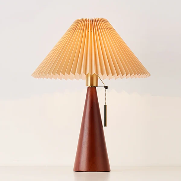 Doubling as a modern accent piece and a source of light, this Stringer Table Lamp makes a statement as it boosts the brightness in your space. Defined by its distinctive mix of materials