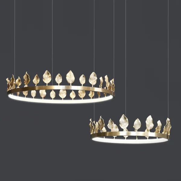 Our Anello Chandelier is shaped like a crown made of laurel leaves. The design is brilliant in a mix of contemporary gold leaf and painted gold finishes. Because the leaves are hand-applied, slight variations in shape may exist on this gold chandelier.