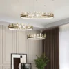 Our Anello Chandelier is shaped like a crown made of laurel leaves. The design is brilliant in a mix of contemporary gold leaf and painted gold finishes. Because the leaves are hand-applied, slight variations in shape may exist on this gold chandelier.