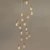 This chandelier uses artificial bubble technology to connect floating bubble shapes to create wonderful light and shadow. The surface is round and smooth, with bubbles inside, and the transmission is even, which perfectly integrates light and art.