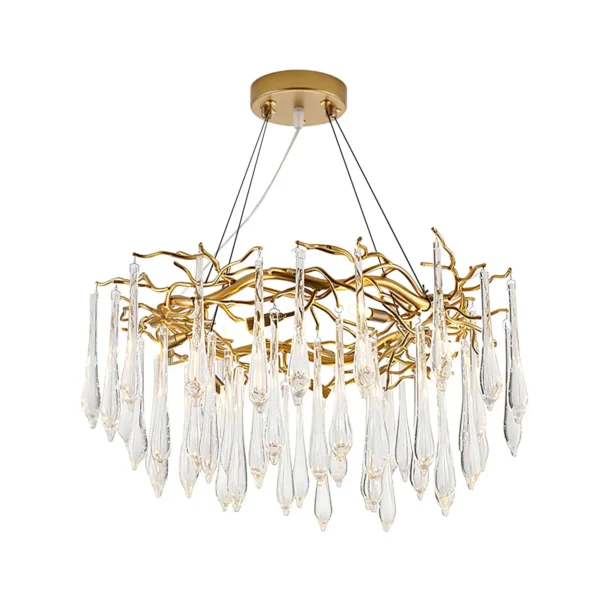 A mesmerizing statement that will inspire awe from above, the fitting features organically formed brass branches dripping with teardrop shapes of handblown glass. Crafted so that it plays with light in an enchanting manner, the chandelier would command attention in a contemporary space.