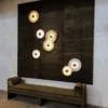 The translucent alabaster planes of the median series are intersected by a fluted brass form, referencing traditional middle eastern jewelry while pushing it through a futurist lens. the stone glows from a light source that remains hidden, illuminating the relationship between the solid and the permeable.